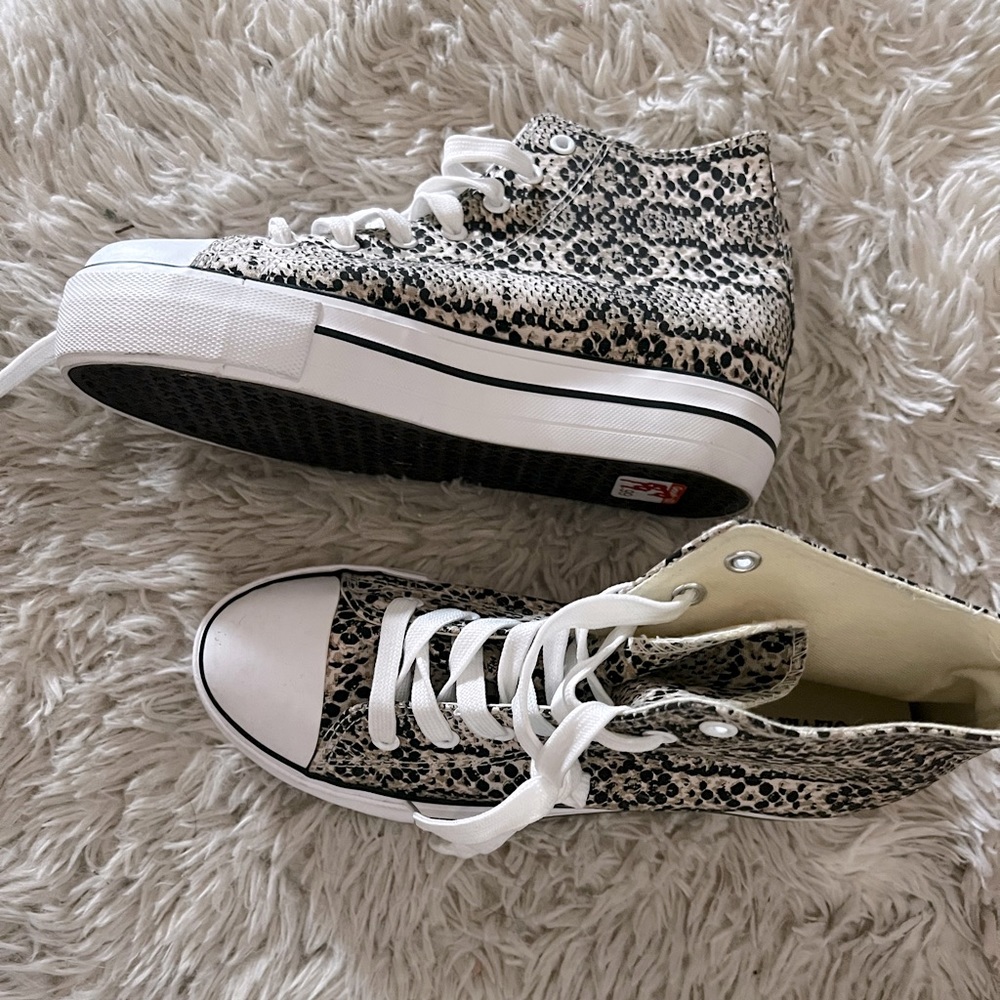 Snakeprint platform sneakers that resemble Converse